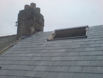 Velux fitted and lead work to chimney added